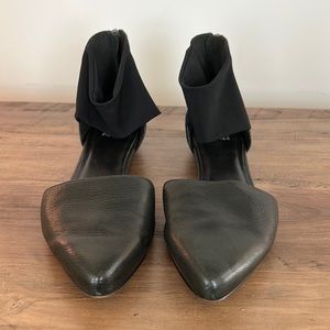 Black leather flats